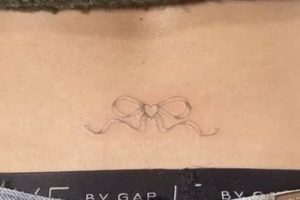 Cute Bow Tramp Stamp Tattoo Ideas & Designs Old Stamp Collecting Guide: Discover, Value & Preserve Vintage Stamps Cute Bow Tramp Stamp Tattoo Ideas & Designs | Old Stamp Collecting Guide: Discover, Value & Preserve Vintage Stamps
